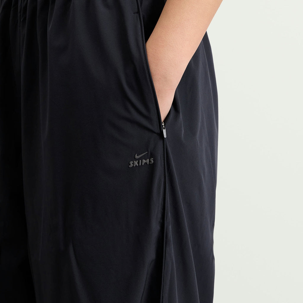Nike Women's x SKIMS Stretch Nylon Oversized Pants in Obsidian