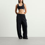 Nike Women's x SKIMS Stretch Nylon Oversized Pants in Obsidian