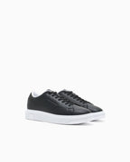 Sneakers in pelle con suola in gomma e tallone a contrasto Slide 1